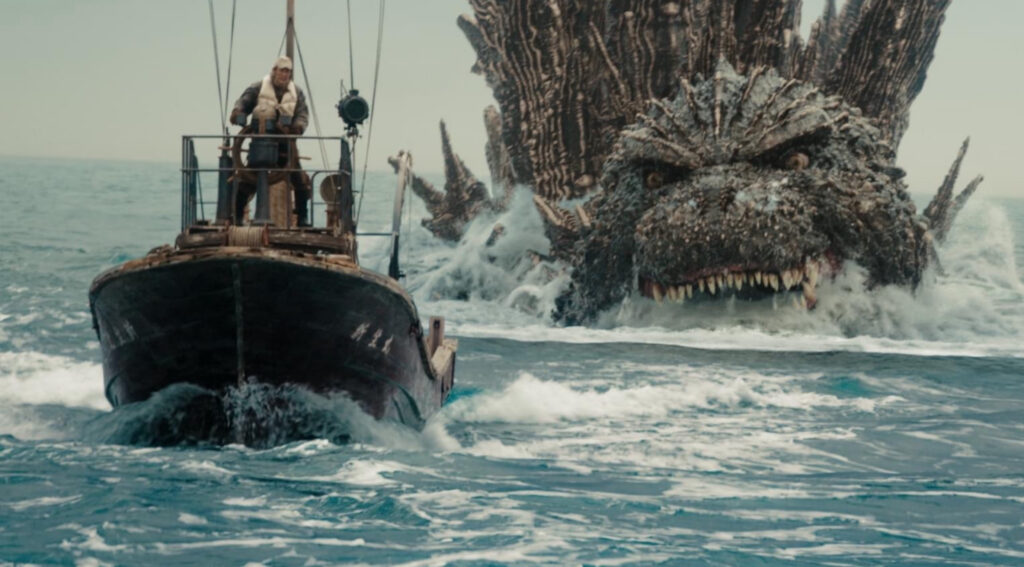 Image du film. 
Un petit bateau pourchassé par Godzilla