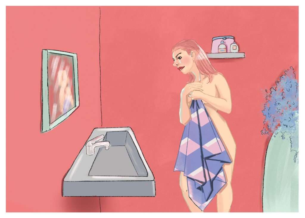 Une dame dans une salle de bain 