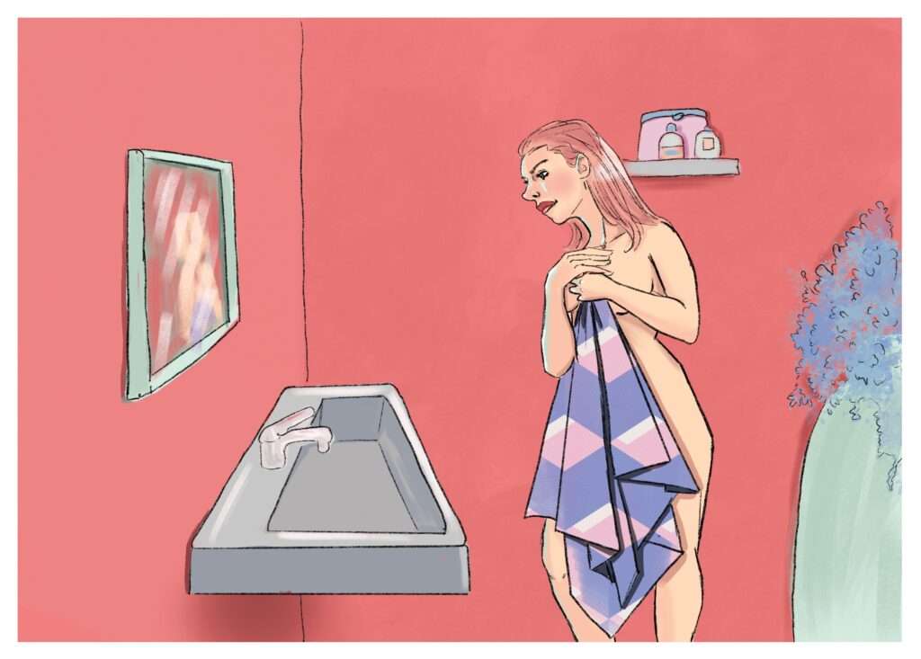 Une dame dans une salle de bain